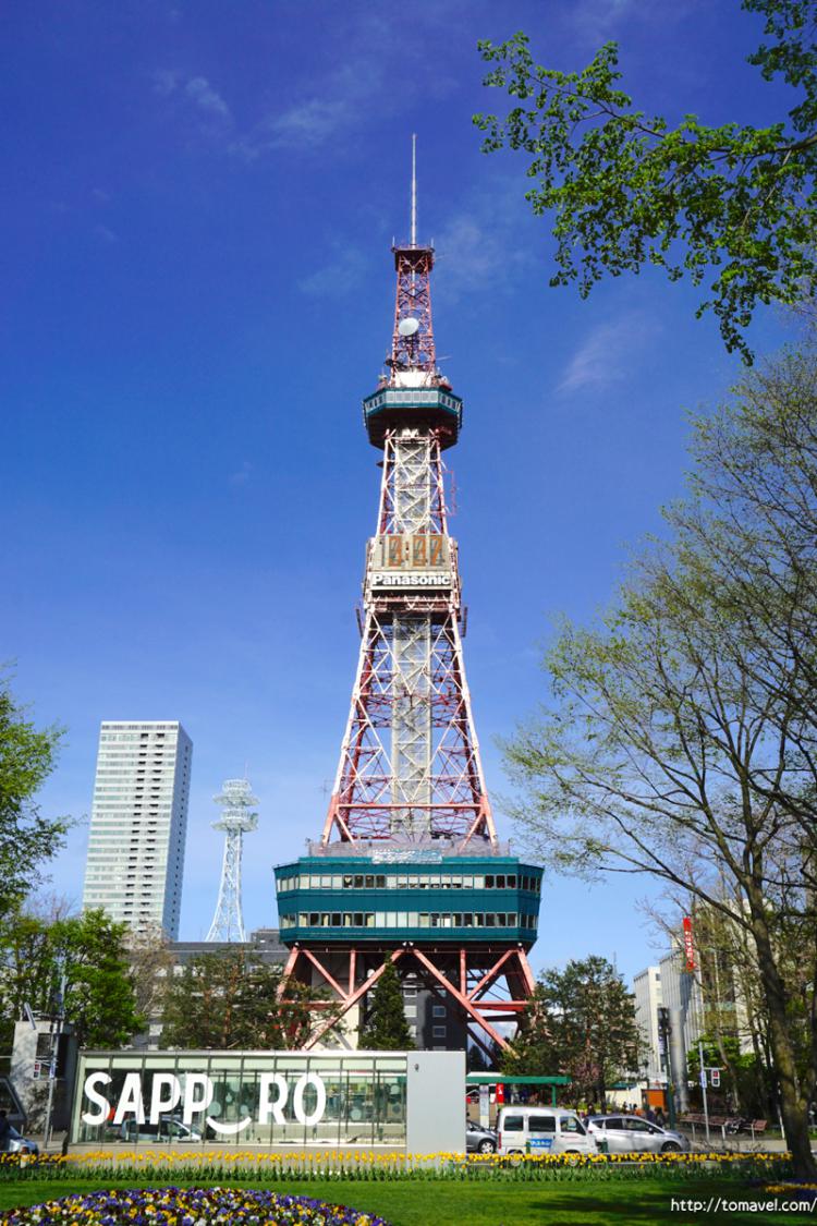 Sapporo TV Tower and blue sky seen from Odori park plaza in day time